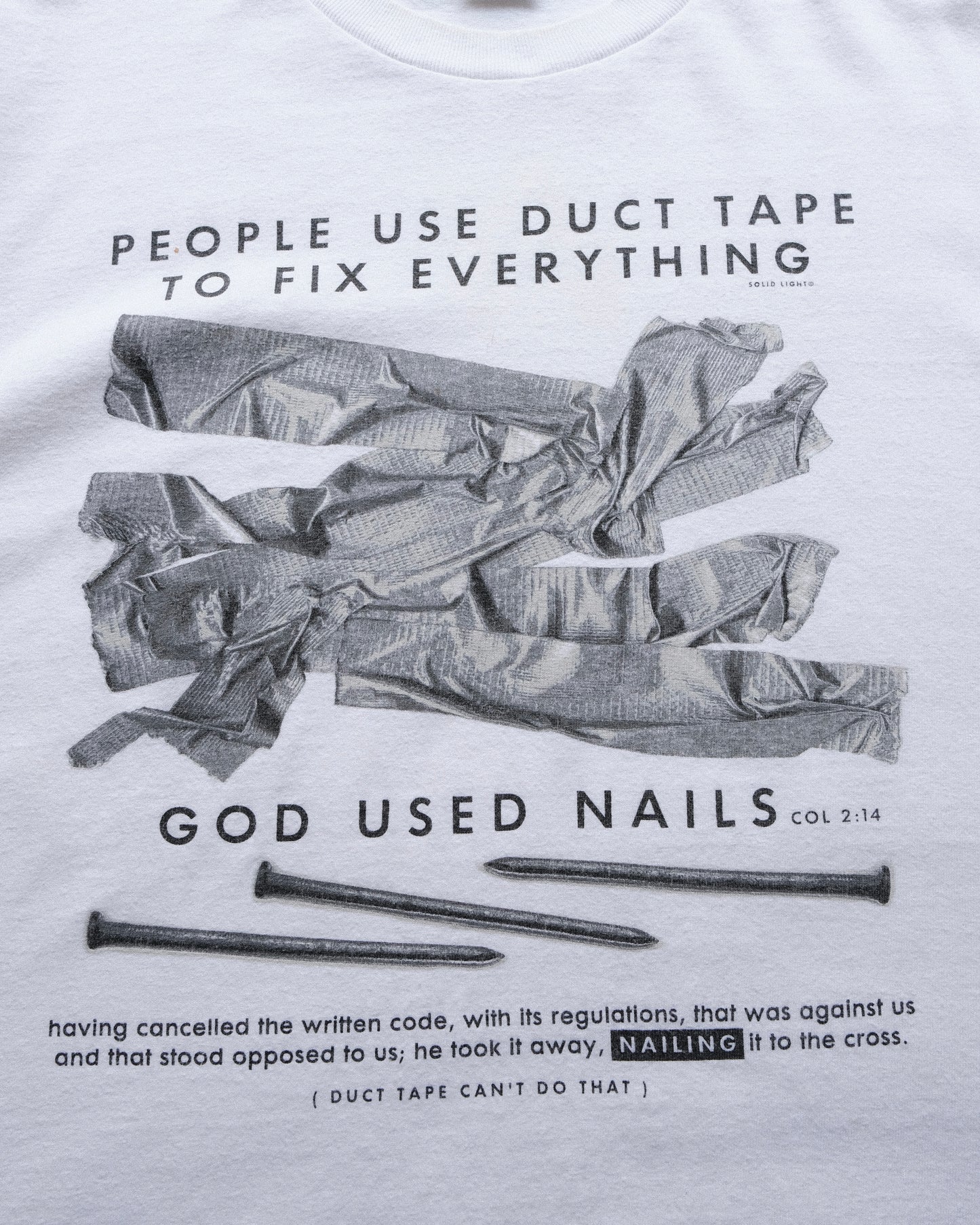 Solid Light “People Use Duct Tape To Fix Everything, God Used Nails” T-Shirt